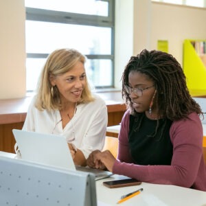 Girl with tutor in a summer math program.