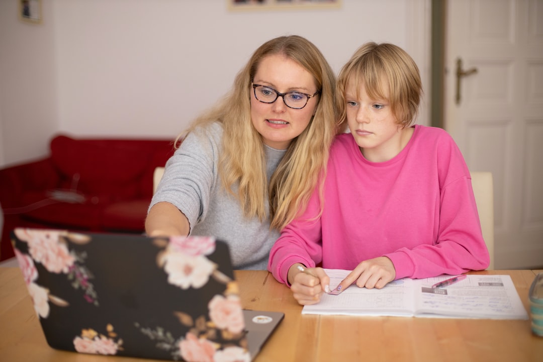 A tutor helping a student with their studies.
