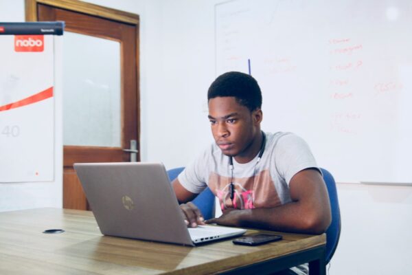 Student studying on laptop, representing which math formulas should you memorize for the SAT