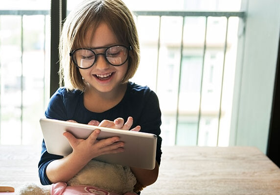 girl using browsing tablet for e learning